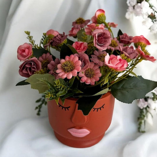 Artificial Pink Floral Arrangement with Cute Face Design Ceramic Vase